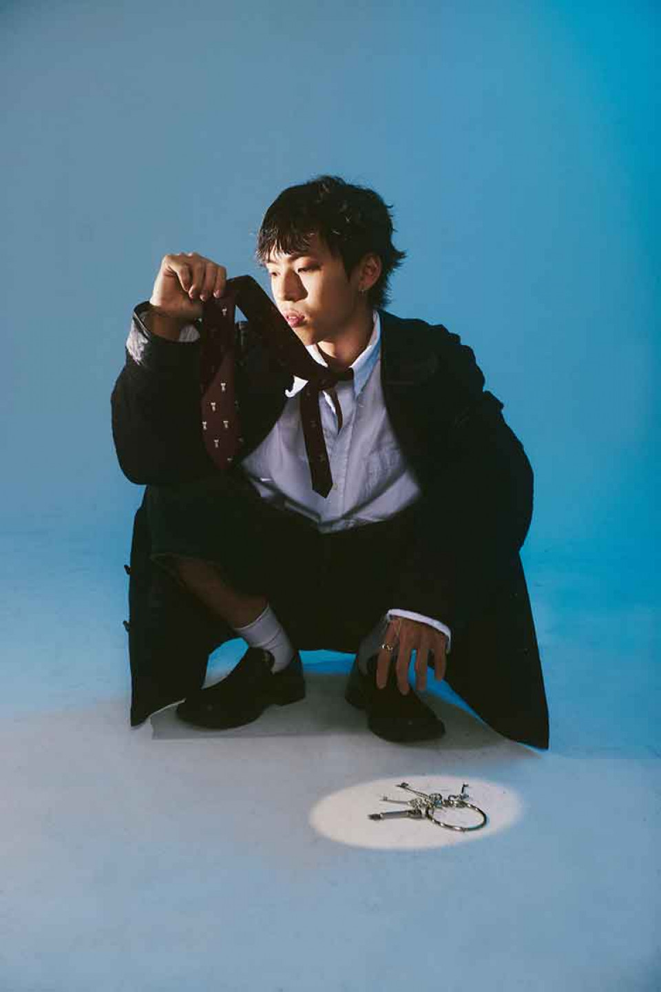 專輯名稱結合「鎖」、「鑰匙」與「吊墜」的主題